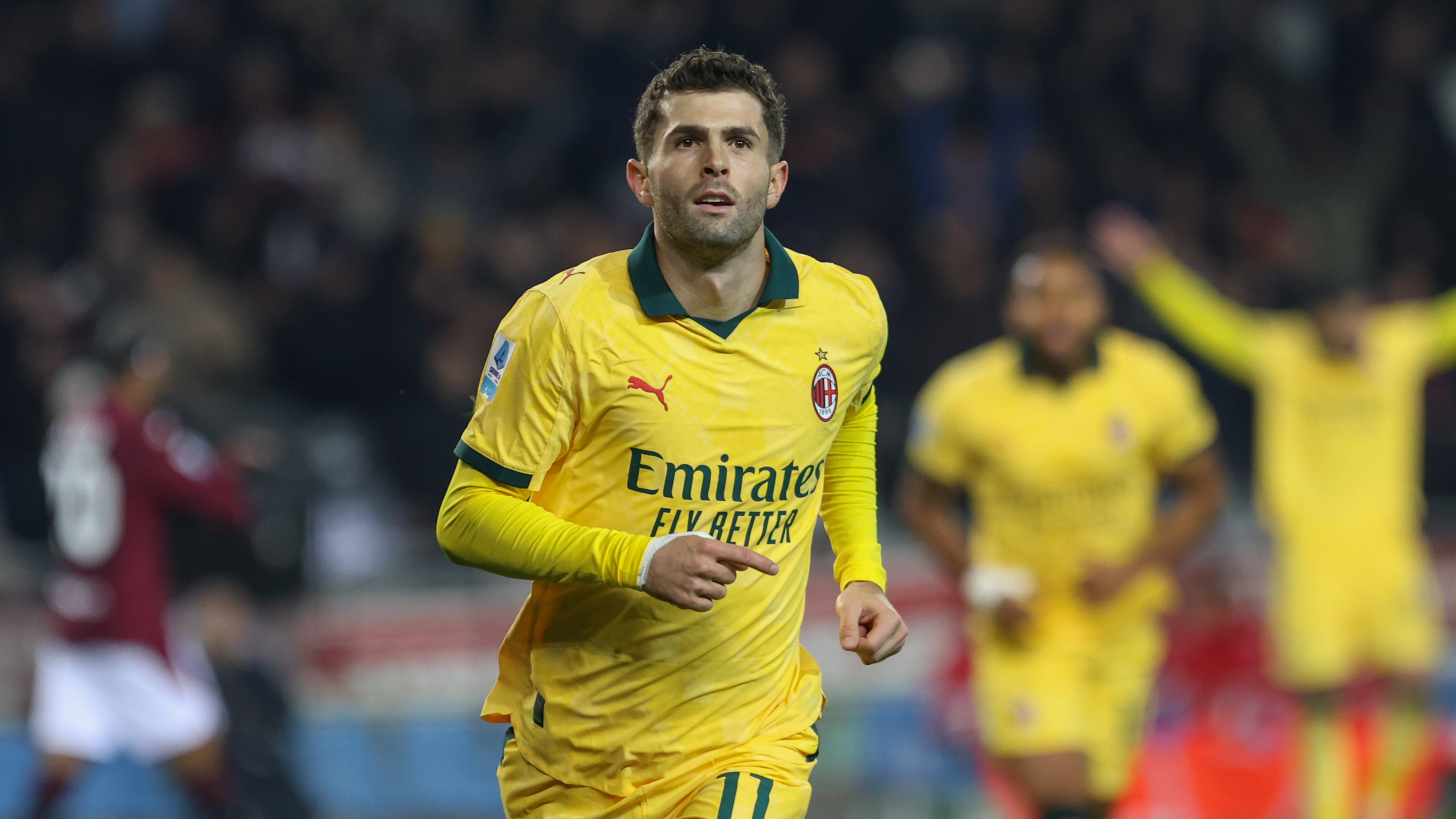 Milan's Christian Pulisic celebrates after scoring a goal during the Serie A soccer match between Torino FC and Milan in Turin, Italy, Monday, Dec. 8, 2025. (Tano Pecoraro/LaPresse via AP)