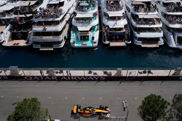 McLaren driver Lando Norris of Britain steers his car during the Formula One Monaco Grand Prix race at the Monaco racetrack in Monaco, Sunday, May 25, 2025. (AP Photo/Manu Fernandez)
