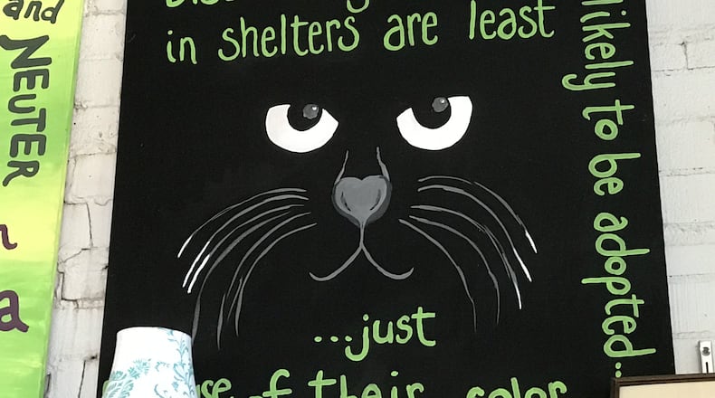 Pet art at the Second Life Atlanta thrift shop. CREDIT: SHELIA POOLE