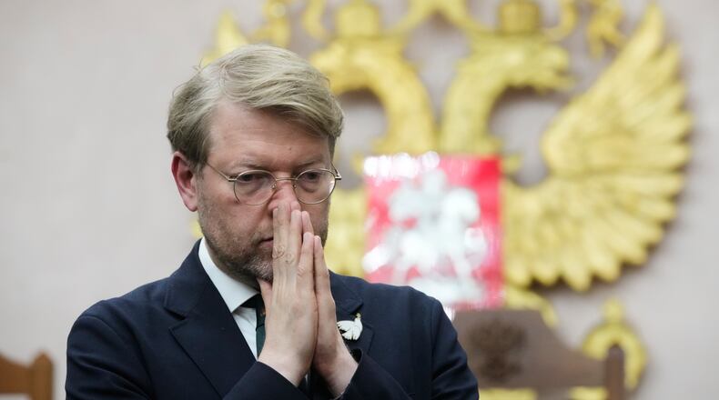 Yabloko party leader Nikolai Rybakov stands after a hearing on a lawsuit to bar the party from the upcoming parliamentary elections, at the Russia's Supreme Court, in Moscow, Monday, Aug. 10, 2026. (AP Photo/Pavel Bednyakov)