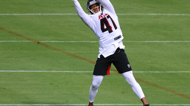 081520 Flowery Branch: Atlanta Falcons safety Sharrod Neasman goes up to intercept a pass during training camp on Saturday, August 15, 2020 in Flowery Branch. Curtis Compton ccompton@ajc.com