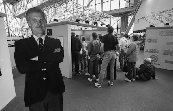 A cardboard cutout of Ted Turner stands watch during a tour at the CNN Center in March 1991. (John Spink/AJC 1991)