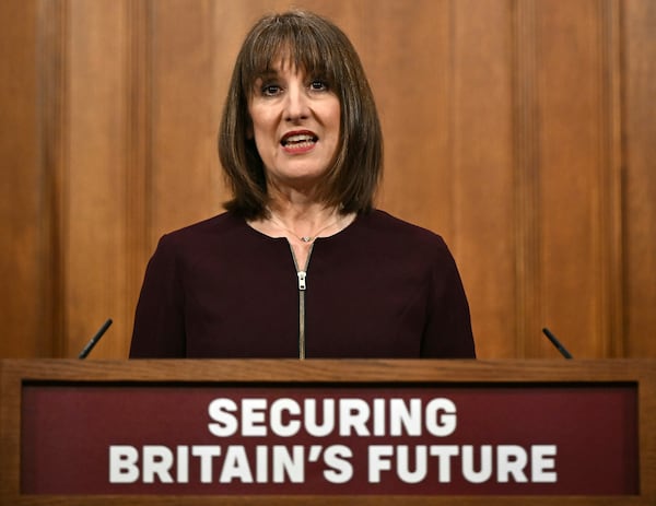 Britain's Chancellor of the Exchequer Rachel Reeves speaks during a press conference in the Downing Street Briefing Room in Downing Street, London, England, Wednesday, March 26, 2025. (Ben Stansall/Pool Photo via AP)