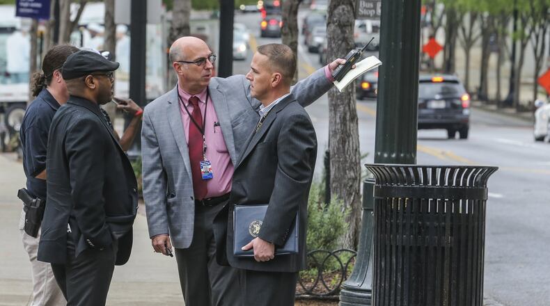 A woman was shot and killed Monday morning on Peachtree Street in Midtown Atlanta. (Photo: JOHN SPINK /jspink@ajc.com)