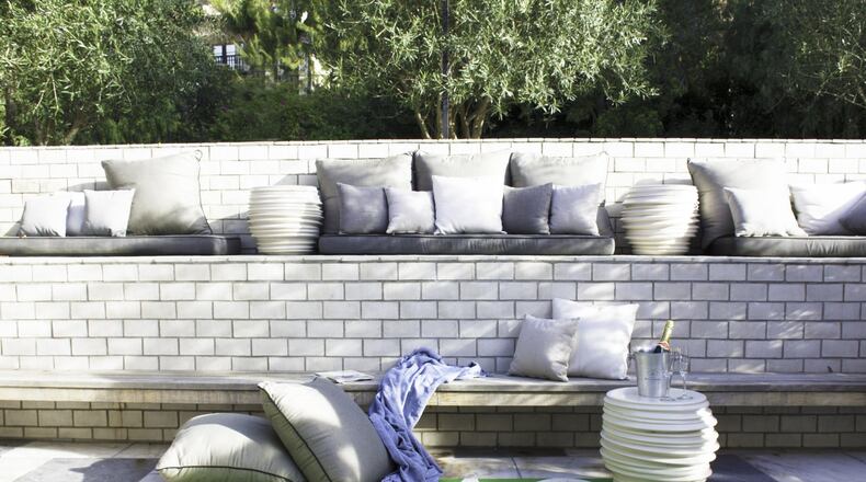 The Grass Green Area Rug from the Robert and Cortney Novogratz’s indoor/outdoor rug line brings a splash of spring to a California patio. CONTRIBUTED BY Robert and Cortney Novogratz