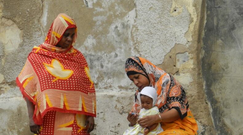 "Three generations of ladies out for the day in Stone Town Zanzibar," wrote Glen Gesler of Milton