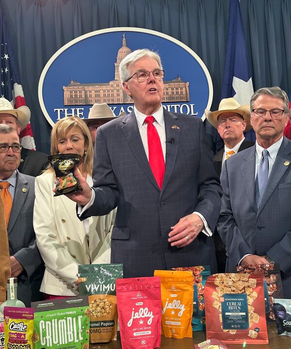 Texas Lt. Gov. Dan Patrick shows products containing THC while calling for a ban on the consumables on Wednesday, May 28, 2025, at the state Capitol in Austin, Texas. (AP Photo/Jim Vertuno)