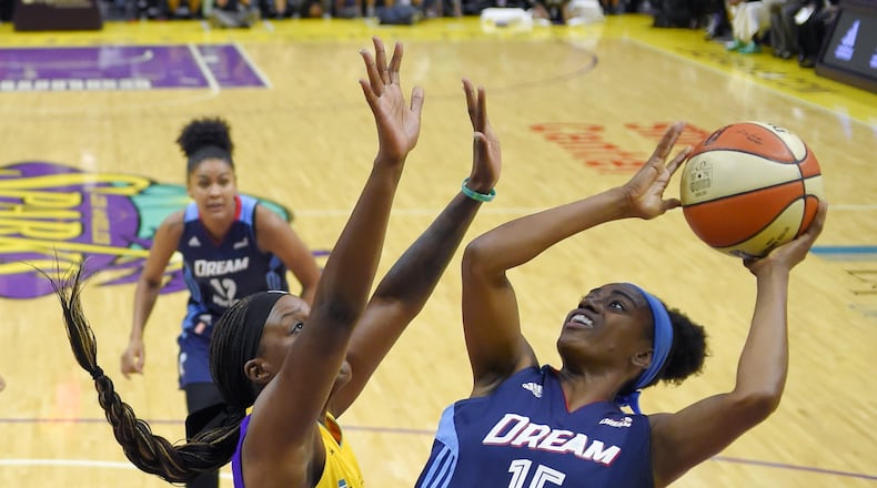 Atlanta Dream guard Tiffany Hayes, right, shoots as Los Angeles Sparks forward Tiffany Jackson-Jones defends during the second half of a WNBA basketball game, Friday, Sept. 1, 2017, in Los Angeles. The Sparks won 81-56. (AP Photo/Mark J. Terrill)