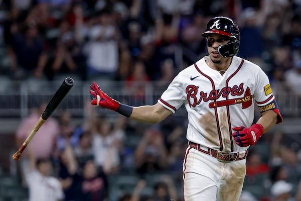 Braves utilityman Mauricio Dubón flips his bat after hitting a solo home run against the Blue Jays during the eighth inning Thursday, June 4, 2026, in Atlanta. (Erik S. Lesser/AP)