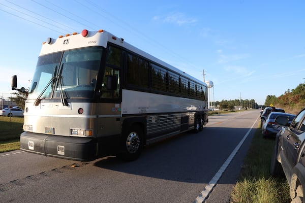 A bus leaves the Folkston Immigration and Customs Enforcement processing center on Wednesday, Sept. 10, 2025, in Folkston. (Gary McCullough/AP)