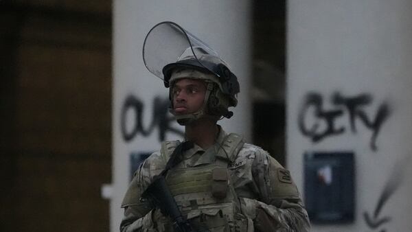 California National Guards guard Federal Building in downtown Los Angeles, Tuesday, June 10, 2025. (AP Photo Damian Dovarganes)