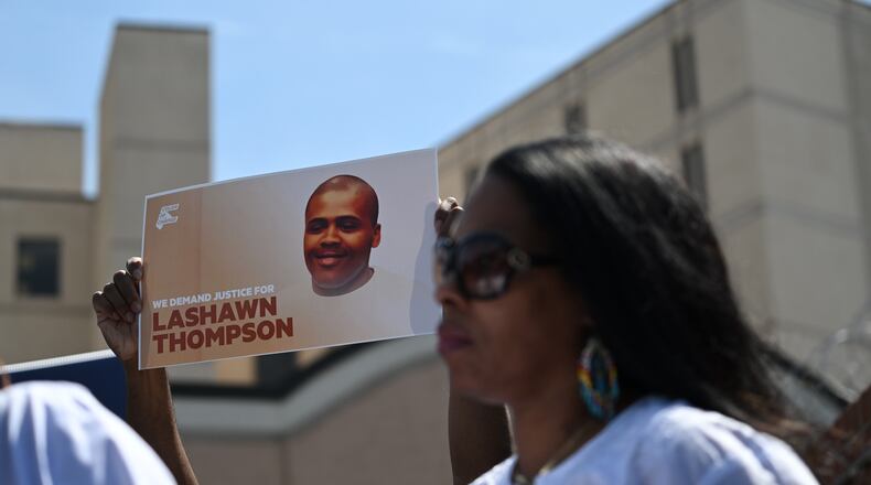 Supporters for Lashawn Thompson’s family rally outside the Fulton County Jail in April. Thompson, 35, was discovered unresponsive in the jail’s psychiatric wing covered in bed bugs in September, according to a Fulton County Medical Examiner report. His body showed no obvious signs of trauma and the cause of death was undetermined, the report said, noting a “severe bed bug infestation” in the jail. (Hyosub Shin / Hyosub.Shin@ajc.com)