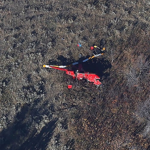 Wreckage from a helicopter carrying family members of an Illinois gubernatorial candidate that crashed on Oct. 22, 2025 is seen near Ekalaka, Mont. on Oct. 23, 2025. (Larry Mayer/The Billings Gazette via AP)