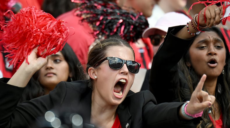 Georgia fans cheer before an NCAA football game between Georgia and Auburn at Sanford Stadium, Saturday, October 5, 2024, in Athens. (Hyosub Shin / AJC)
