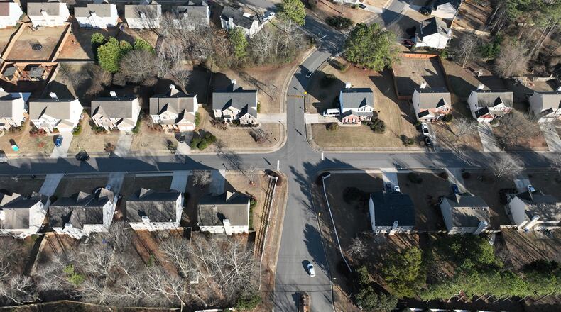 Aerial view of Winslow at Eagles Landing neighborhood, where a large number of homes are owned by investors, Thursday, Jan. 26, 2023, in McDonough. Two companies — Invitation Homes and Progress Residential — each own more than 10,000 homes in the metro Atlanta area as of, or near the end of, the 2nd quarter 2022. In fact, there are 11 companies with ties to private equity that own more than 1,000 homes, according to an AJC analysis. (Hyosub Shin / Hyosub.Shin@ajc.com)