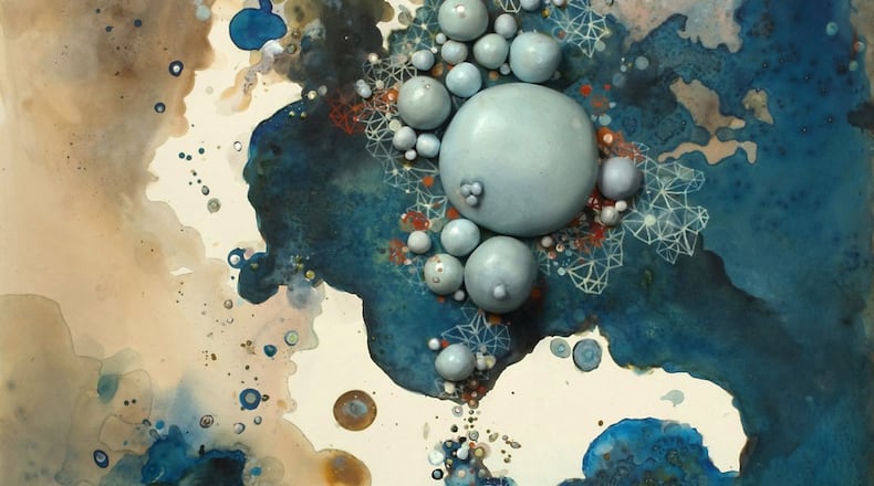 Paintings in acrylic, ink and painted clay like “Simmer” can suggest solar systems or the creation of some new form and express artist Laura Bell’s themes of flux, change and transformation.