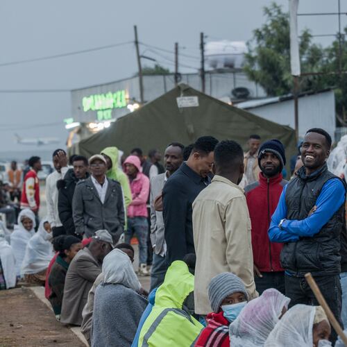 People gather outside a polling station before casting their votes in the general election in Addis Ababa, Ethiopia, Monday, June 1, 2026. (AP Photo/Amanuel Sileshi)