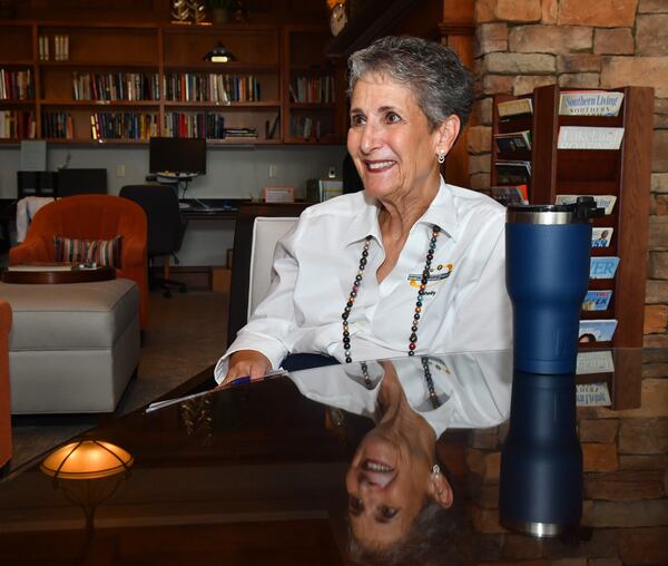 220803 Hoschton, Ga: "The best compliment I have had, showing that I have done a good job, is when clients tell me they put me in their will... telling their children to have me list their property [for sale]." Shelly Bloom in the study area of the clubhouse in Deaton Creek Village. Aging in Atlanta Community Connections profile of Shelly Bloom, who helps seniors find homes in active adult communities. Photos taken Wednesday August 3, 2022 at The Village at Deaton Creek, 55+ active adult community in Hoschton, Ga. For AAJC10022022COMMUNITYCONNECTIONSAIA. (CHRIS HUNT FOR THE ATLANTA JOURNAL-CONSTITUTION)