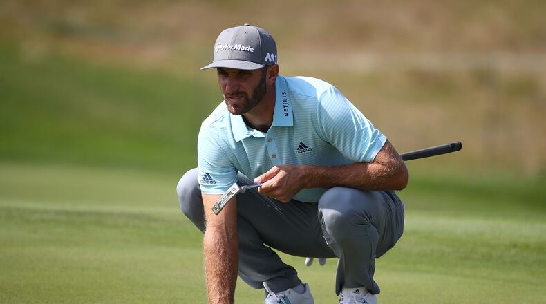 Dustin Johnson demonstrates his version of a three-point stance prior to this week's Tour Championship at East Lake.(Greg Shamus/Getty Images)