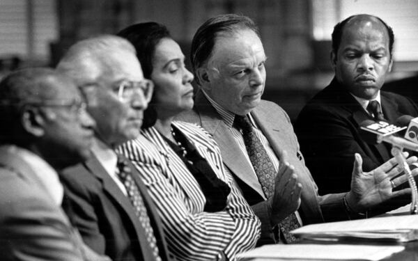At a City Hall Council chambers news conference, members of the Black/Jewish Coalition in Atlanta came together to denounce the anti-Jewish statements made by Muslim minister Louis Farrakhan. (Left to right): Rev. Norman Rates, chairman of Dept. of Religion at Spelman College; Gerald Cohen, president of Atlanta Jewish Federation; Coretta Scott King; Cecil A. Alexander, local civic leader and City Councilman John Lewis. (Andy Sharp/AJC 1984)
