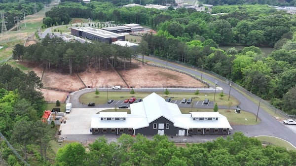 The Atlanta Public Safety Training Center includes classrooms, horse stables (shown here), a burn tower for firefighters and small buildings for police to train in active shooter situations. (Miguel Martinez/AJC)