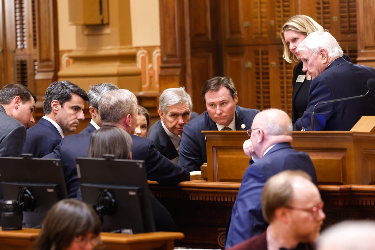 Leaders convene while the House is at ease at the House of Representatives on Sine Die, the last day of the legislature, at the Capitol in Atlanta on April 2, 2026. (Arvin Temkar/AJC)