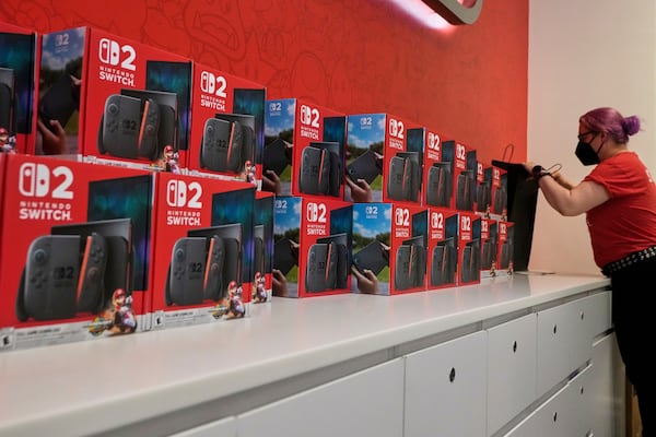 Nintendo Switch 2 devices are ready for sale at the Nintendo store in New York's Rockefeller Center, Thursday, June 5, 2025. (AP Photo/Richard Drew)