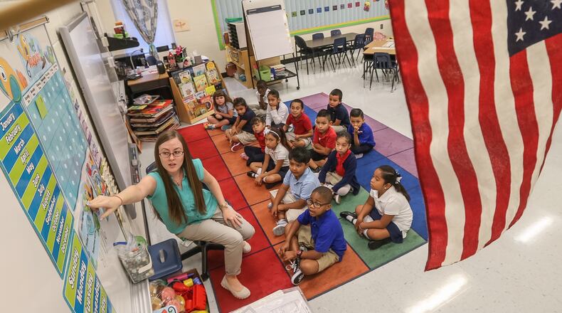 Jennifer Williams' first grade class is already absorbed in the day's lesson.