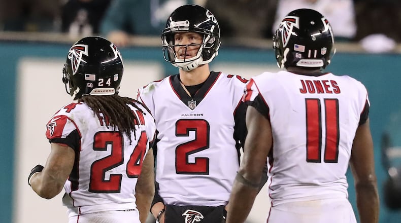 The Falcons’ offense -- led by (from left) Devonta Freeman, Matt Ryan and Julio Jones -- fell far short of expectations this season, which ended in Saturday’s 15-10 playoff loss to the Philadelphia Eagles.