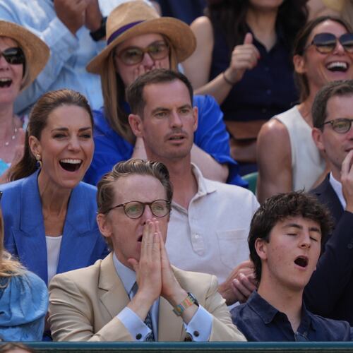 Britain's Kate, Princess of Wales, laughs next to former tennis player Andy Murray as they watch the second round women's singles match between Katie Swan of Britain and Madison Keys of the United States, at the Wimbledon Tennis Championships in London, Thursday, July 2, 2026. (AP Photo/Maja Smiejkowska)