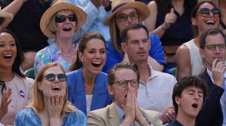 Britain's Kate, Princess of Wales, laughs next to former tennis player Andy Murray as they watch the second round women's singles match between Katie Swan of Britain and Madison Keys of the United States, at the Wimbledon Tennis Championships in London, Thursday, July 2, 2026. (AP Photo/Maja Smiejkowska)
