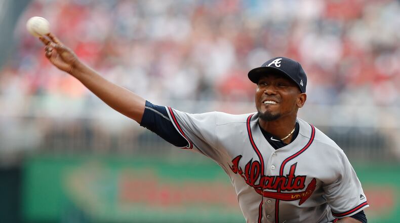 Braves starting pitcher Julio Teheran (49) throws against the Washington Nationals at Nationals Park, Wednesday, June 14, 2017, in Washington.(AP Photo/Carolyn Kaster)