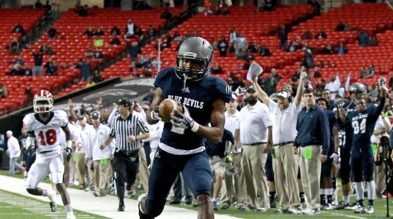 December 14, 2013 - Atlanta, Ga.: Norcross wide receiver Clinton Lynch (2) makes a touchdown catch in the first half of their game against North Gwinnett in the Class AAAAAA championship game at the Georgia Dome Saturday night in Atlanta, Ga., December 14, 2013. JASON GETZ / JGETZ@AJC.COM