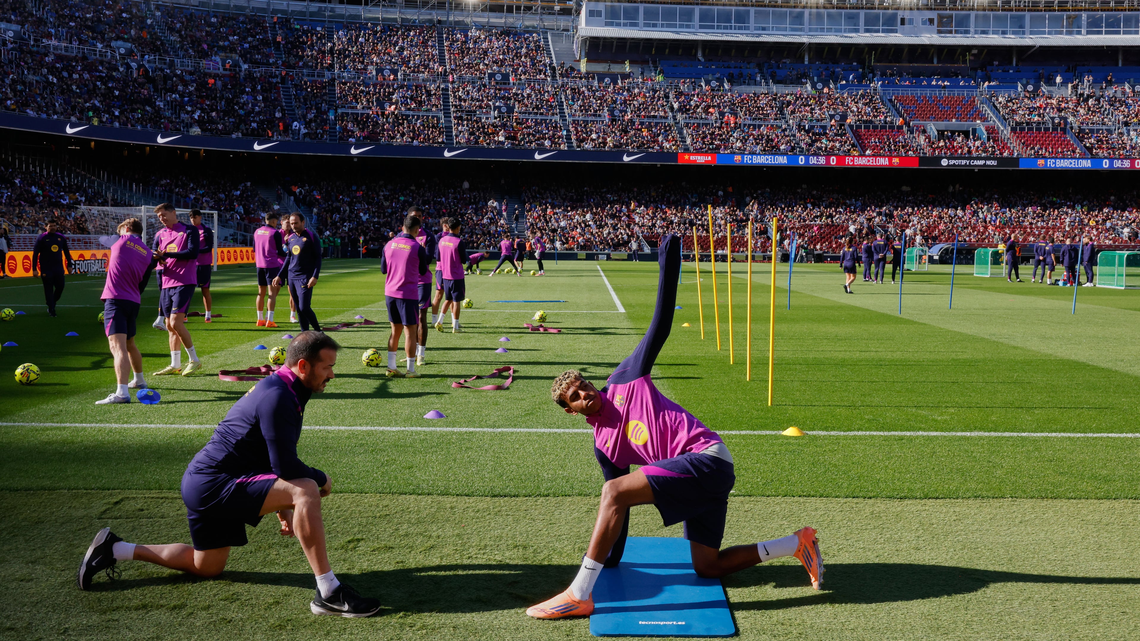 Barcelona's Lamine Yamal exercises during the team's first training session at the venue after its renovation at the Camp Nou stadium in Barcelona, Spain, Friday, Nov. 7, 2025. (AP Photo/Joan Monfort)