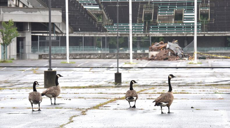 An empty parking lot near the Stone Mountain Tennis Center in the Evermore CID area on Tuesday, August 8, 2017. The stadium, which was built for the 1996 Atlanta Olympics, is being torn down. HYOSUB SHIN / HSHIN@AJC.COM