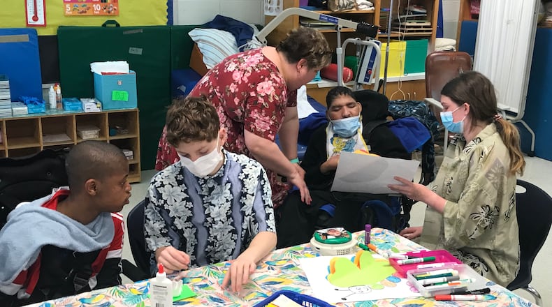 Seventh-graders from the Immaculate Heart of Mary Catholic School spend an hour each week working with special needs students from the Margaret Harris Comprehensive School.