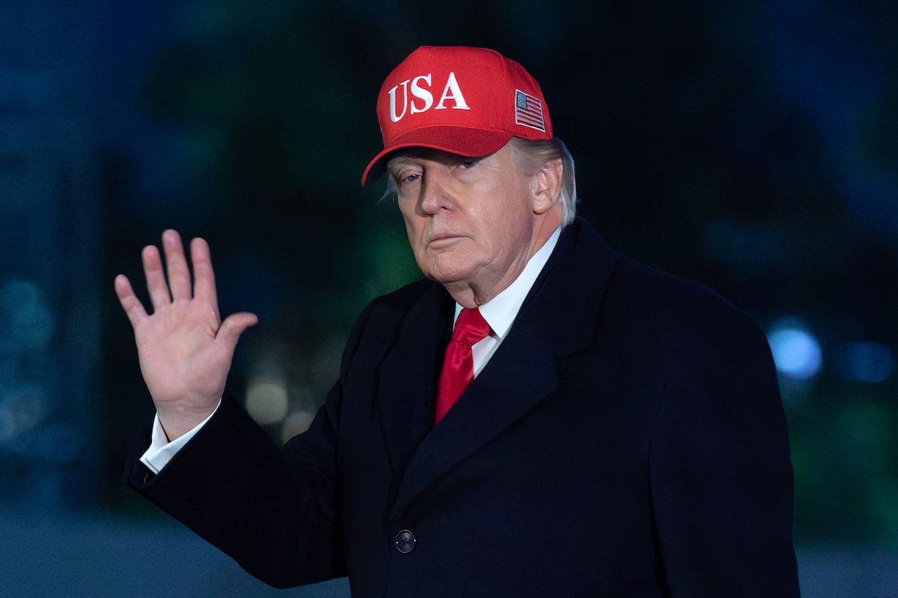 President Donald Trump waves to reporters as he walks on the South Lawn upon his arrival at the White House, Sunday, April 12, 2026, in Washington. (Jose Luis Magana/AP)