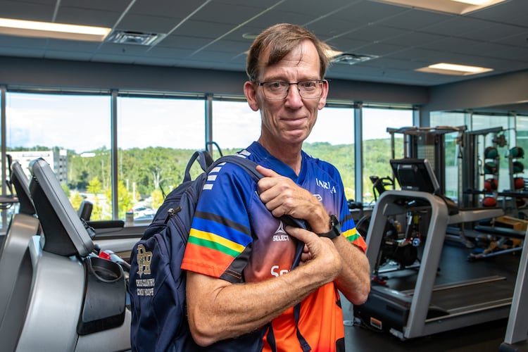 Keith Hooper, a Spanish teacher and running coach at River Ridge High School in Woodstock, spent hours at Northside Hospital Cherokee's rehabilitation facility in Canton for physical therapy after suffering a heart attack in class and undergoing a quadruple bypass in January. (Jenni Girtman for the AJC)