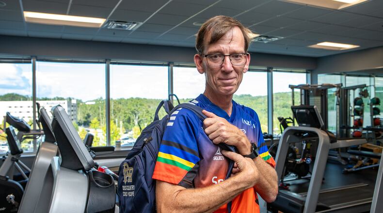 Keith Hooper, a Spanish teacher and running coach at River Ridge High School in Woodstock, spent hours at Northside Hospital Cherokee's rehabilitation facility in Canton for physical therapy after suffering a heart attack in class and undergoing a quadruple bypass in January. (Jenni Girtman for the AJC)