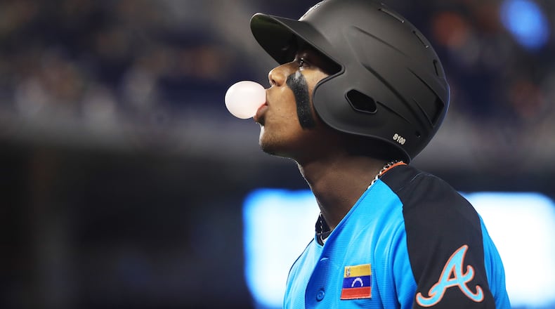 MIAMI, FL - JULY 09: Ronald Acuna #24 of the Atlanta Braves and the World Team looks on against the U.S. Team during the SiriusXM All-Star Futures Game at Marlins Park on July 9, 2017 in Miami, Florida. (Photo by Mike Ehrmann/Getty Images)