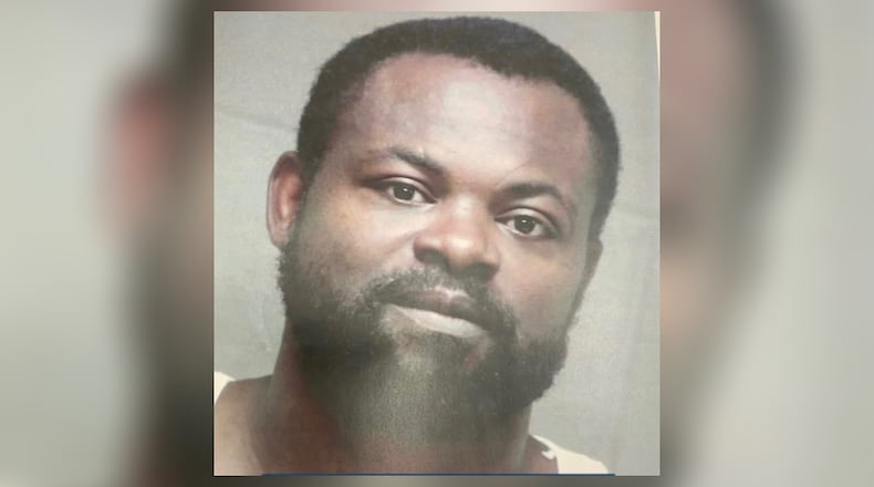 Damien "Luke" Ferguson, 43, was arrested in the deadly shooting of a Middle Georgia officer outside a police station.