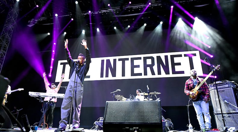 LOS ANGELES, CA - NOVEMBER 12: (L-R) Steve Lacy, Syd tha Kyd, and Patrick Paige of The Internet perform on Camp Stage during day one of Tyler, the Creator's 5th Annual Camp Flog Gnaw Carnival at Exposition Park on November 12, 2016 in Los Angeles, California. (Photo by Kevin Winter/Getty Images)