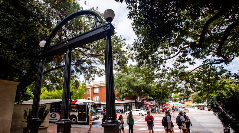 Athens is divided by confusing political district lines, and the results of the 2020 census could be used to redraw the maps to favor one political party over another even more. The current map places the Arch on the campus of the University of Georgia in one state House district and College Square Plaza in another. “This is gerrymandering 101,” said Charles Bullock, a University of Georgia political science professor and author of the book “Redistricting: The Most Political Activity in America.” (Jenni Girtman for The Atlanta Journal-Constitution)