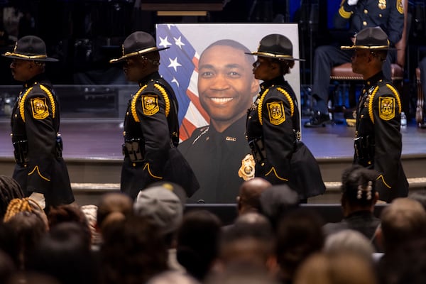 Law enforcement officers processed during the funeral of DeKalb County Police Officer David Rose, who was killed while responding to a shooting at the CDC in Atlanta last month.