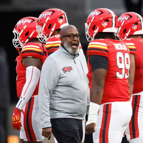 FILE - Maryland head coach Mike Locksley encourages his players before an NCAA football game against Northern Illinois, Sept. 5, 2025, in College Park, Md. (AP Photo/Mike Buscher, File)