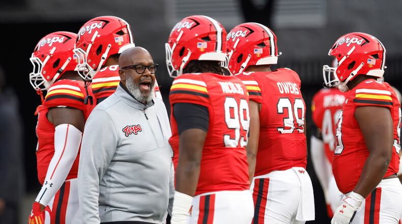 FILE - Maryland head coach Mike Locksley encourages his players before an NCAA football game against Northern Illinois, Sept. 5, 2025, in College Park, Md. (AP Photo/Mike Buscher, File)