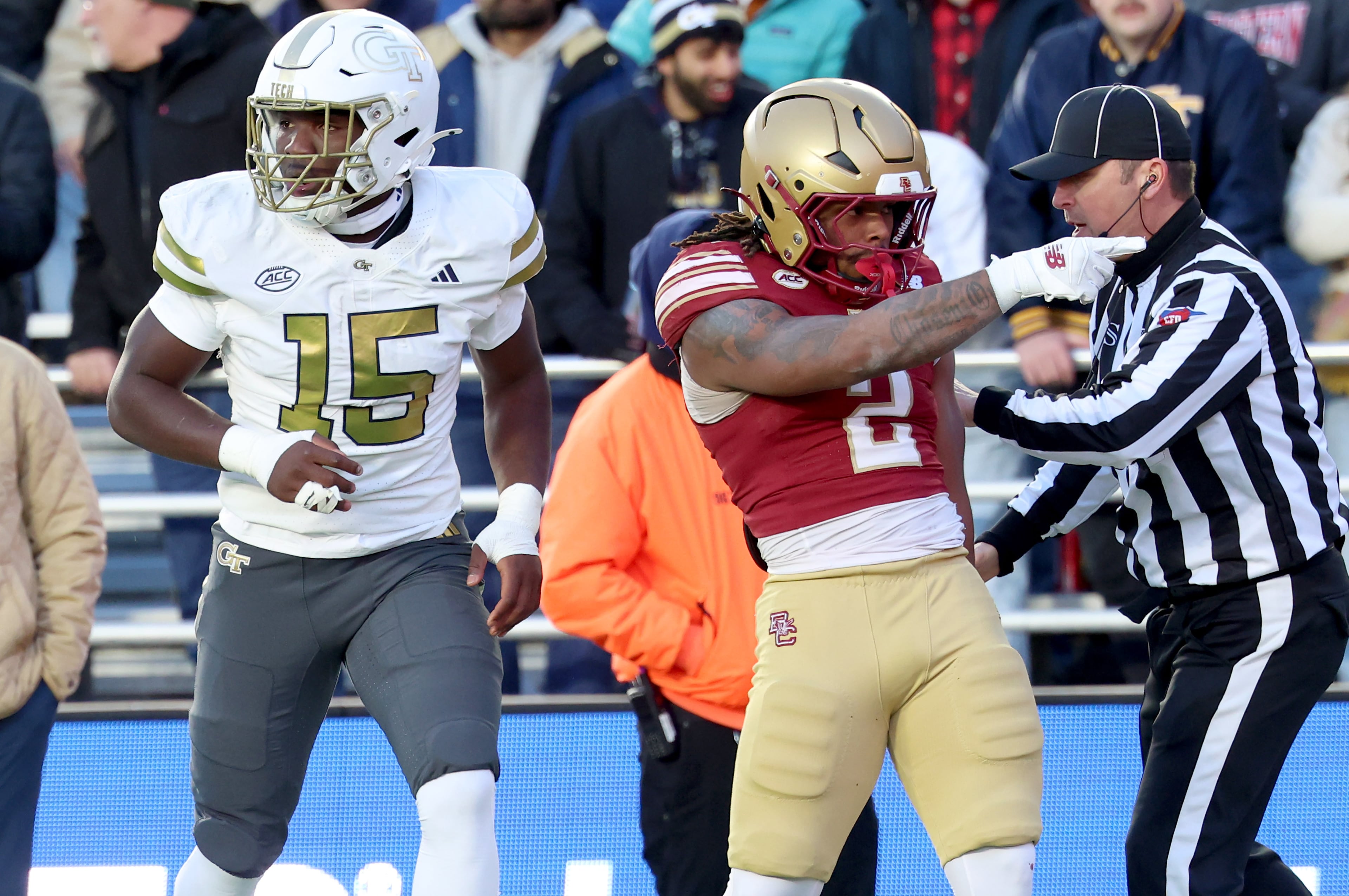 Boston College running back Turbo Richard (2) reacts near Georgia Tech linebacker Tah'J Butler (15) after making a long completion during the first half of an NCAA college football game Saturday, Nov. 15, 2025, in Boston. (AP Photo/Mark Stockwell)