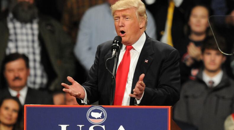 U.S. President-elect Donald Trump speaks at a Victory Tour Rally, on December 8, 2016 in Des Moines, Iowa. Trump is taking time time to speak several of the states that helped him win the election (Photo by Steve Pope/Getty Images)