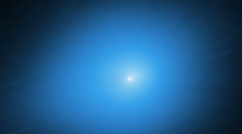 FILE - This image provided by NASA shows the interstellar comet 3I/Atlas captured by the Hubble Space Telescope on Nov. 30, 2025. (NASA, ESA, STScI, D. Jewitt (UCLA), M.-T. Hui (Shanghai Astronomical Observatory), J. DePasquale (STScI) via AP, File)