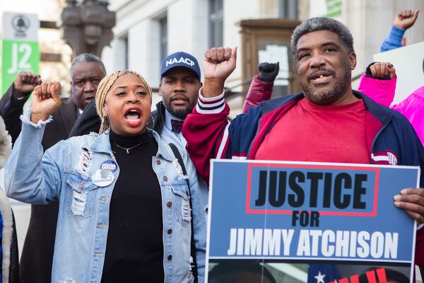 Porch'se Mitchell-Miller (left), Georgia NAACP, and Jimmy Hill (right), father of Jimmy Atchison, protest in 2022. CHRISTINA MATACOTTA FOR THE ATLANTA JOURNAL-CONSTITUTION